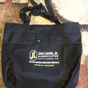 NWOT OUTERBANKS ADJUSTABLE BLACK TOTE BAG